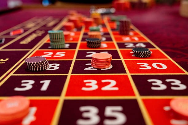 Three Card Poker table on olx188 login mobile app showing ante and play betting options